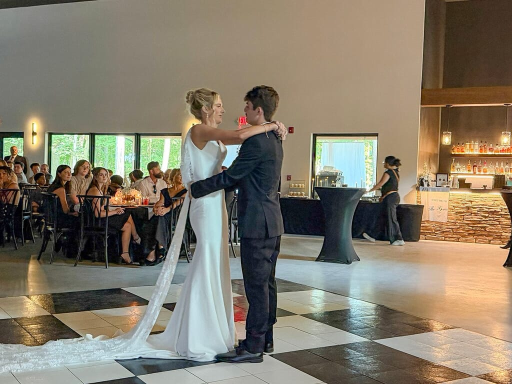 Gallery - Highbanks Wedding & Events Real Weddings 6 Bride and groom sharing a slow dance on the checkered floor at their Highbanks reception.